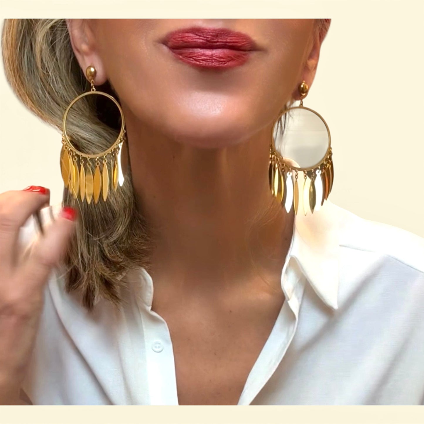 Pendientes aro& plumas dorado