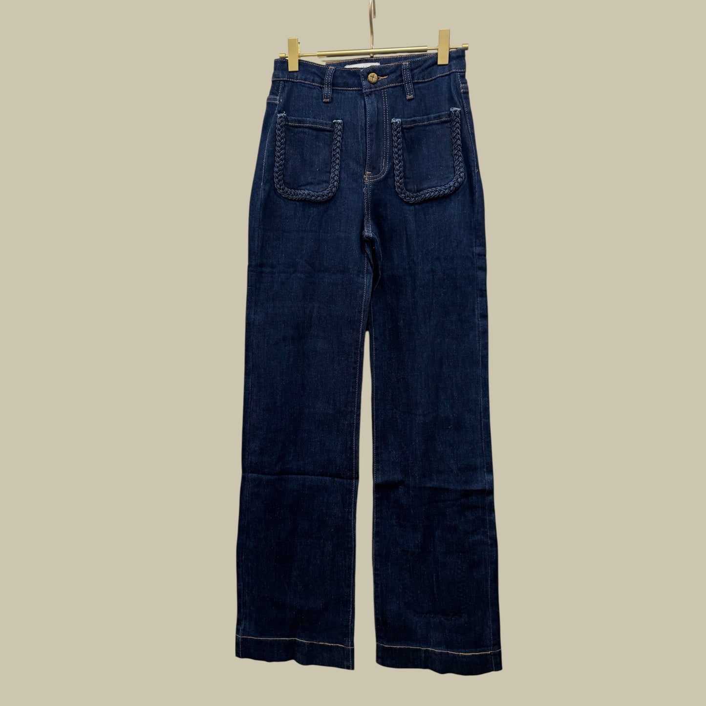 Denim bolsillos trenzados