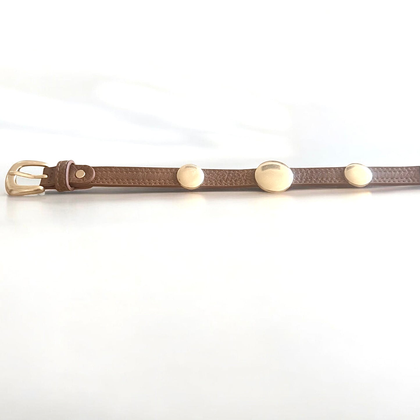 Cinturón círculos dorados marrón