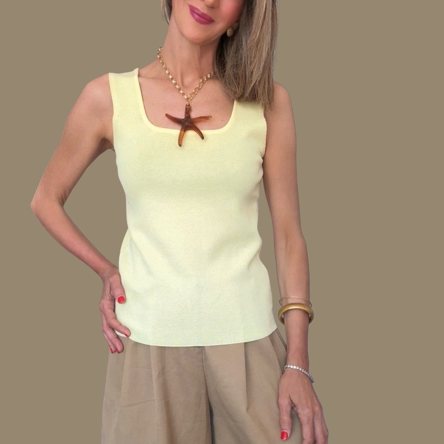 Top amarillo espalda cruzada