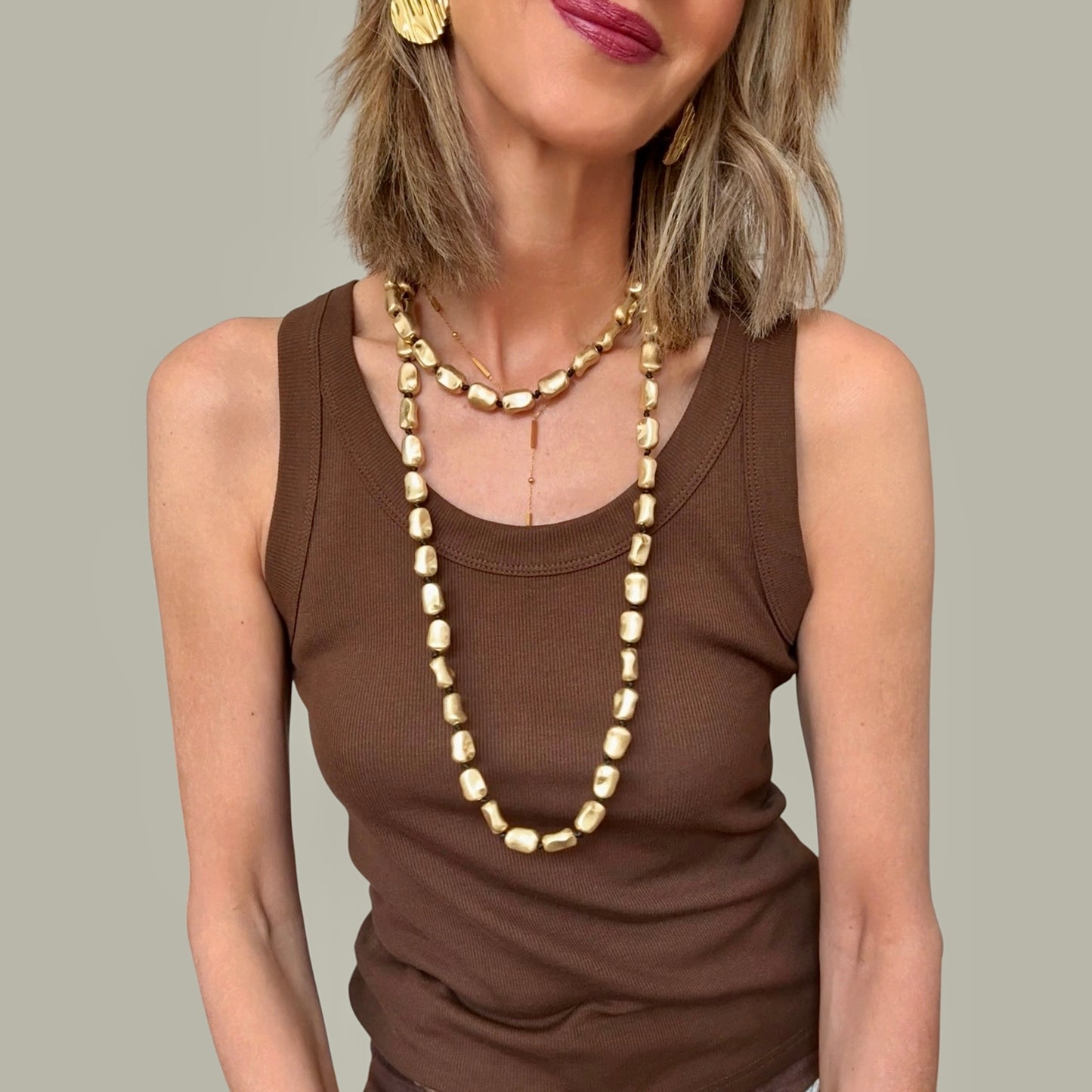 Collar largo piedras dorado
